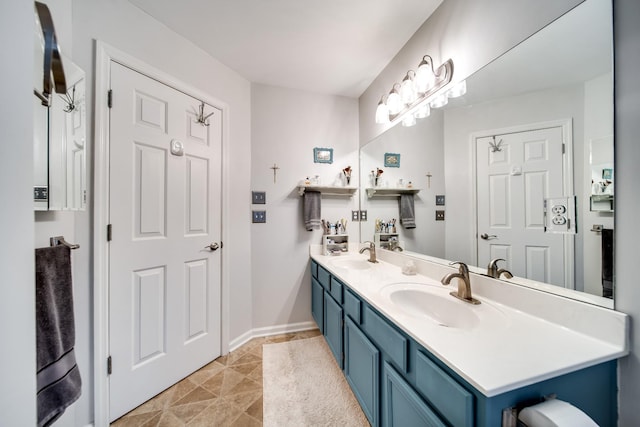 bathroom featuring vanity and tile patterned flooring