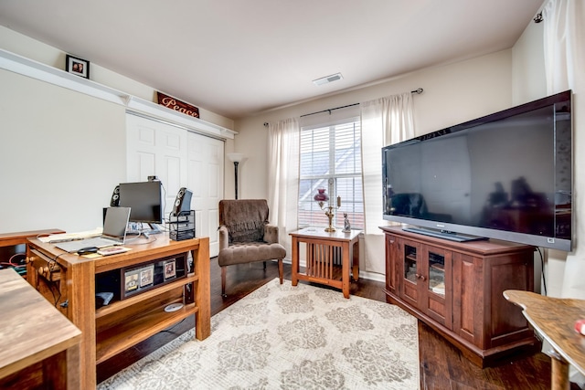 office space with hardwood / wood-style floors