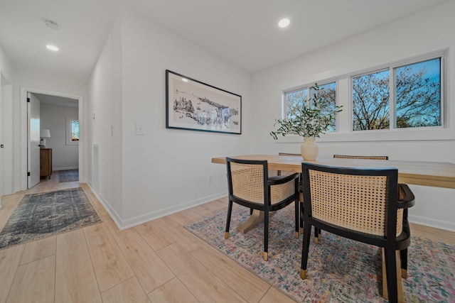 dining room featuring light hardwood / wood-style flooring