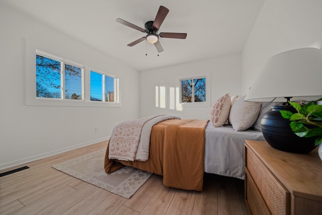 bedroom featuring ceiling fan and light hardwood / wood-style floors