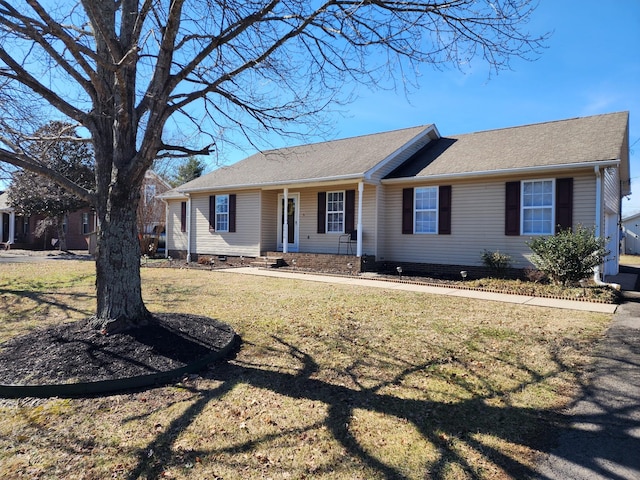 ranch-style home with a front yard