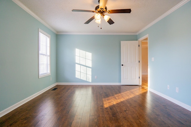 spare room with crown molding, dark wood-type flooring, ceiling fan, and a textured ceiling