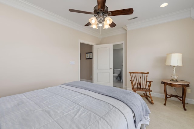 bedroom featuring ornamental molding, light colored carpet, and ceiling fan