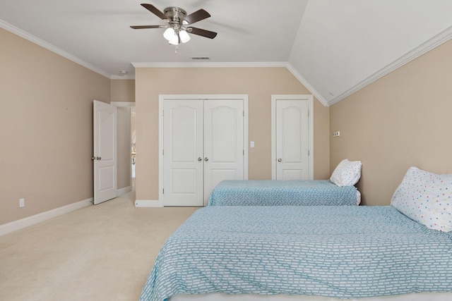 bedroom featuring crown molding, lofted ceiling, light colored carpet, and ceiling fan