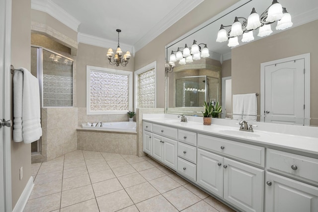 bathroom with plus walk in shower, tile patterned flooring, vanity, a notable chandelier, and crown molding