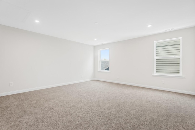 view of carpeted spare room