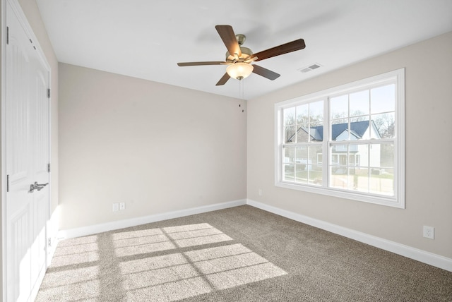 unfurnished bedroom with ceiling fan and carpet flooring