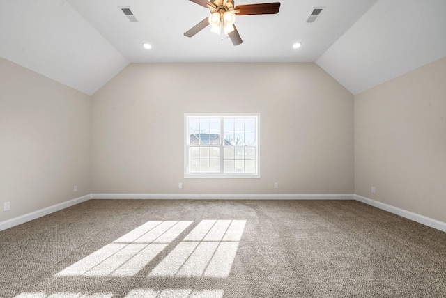 additional living space with ceiling fan, carpet floors, and vaulted ceiling