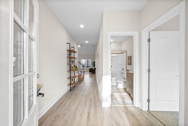 hall featuring light hardwood / wood-style floors