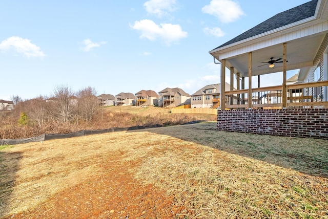 view of yard featuring ceiling fan