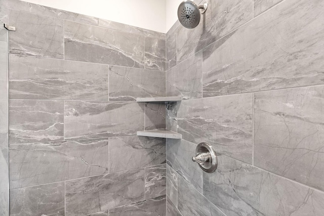 details with a tile shower