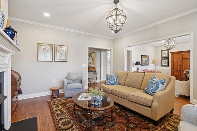 living room with crown molding, dark hardwood / wood-style flooring, and a chandelier