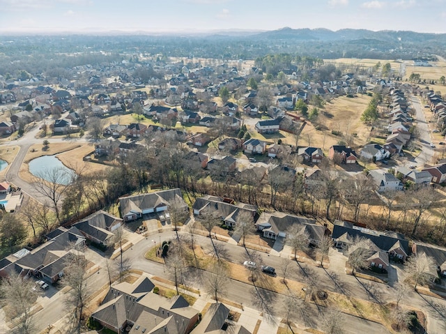 birds eye view of property featuring a mountain view