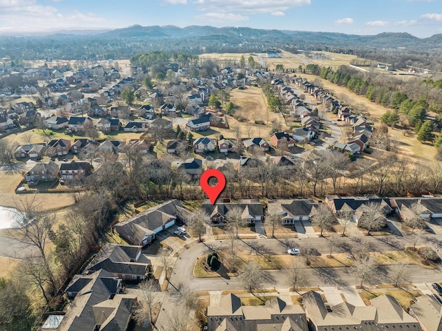 drone / aerial view featuring a mountain view