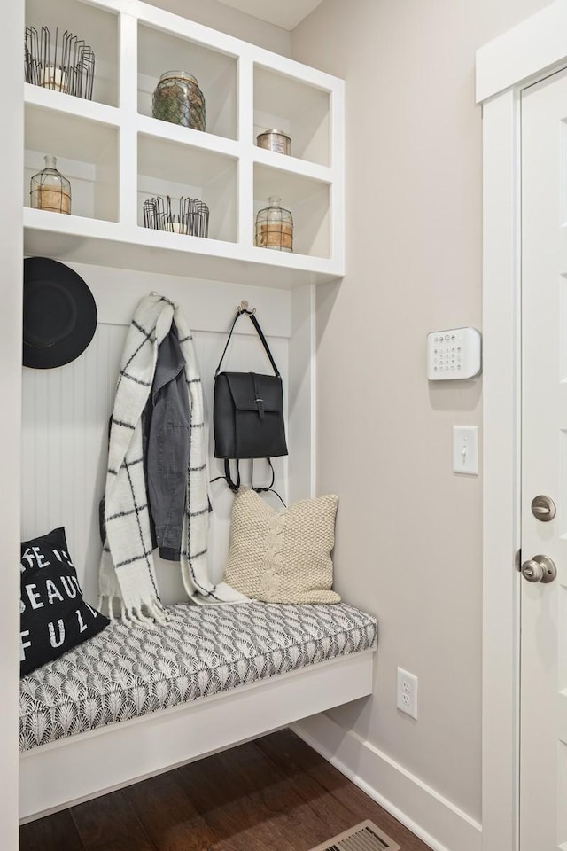 mudroom with dark wood-type flooring