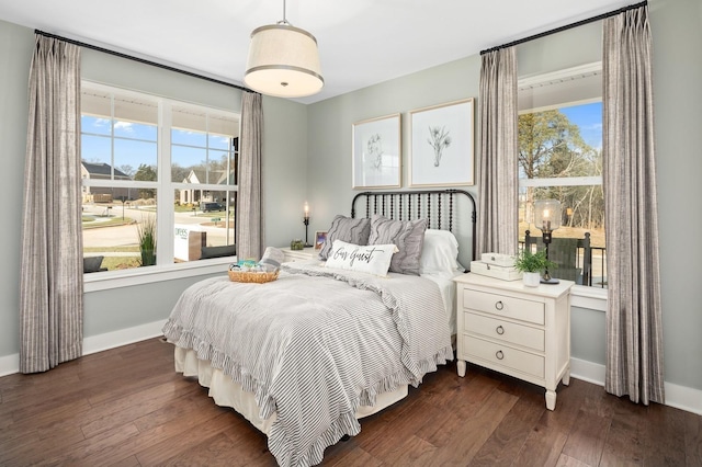 bedroom featuring dark hardwood / wood-style floors