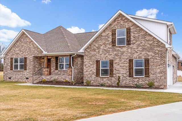 view of front property featuring a garage and a front lawn