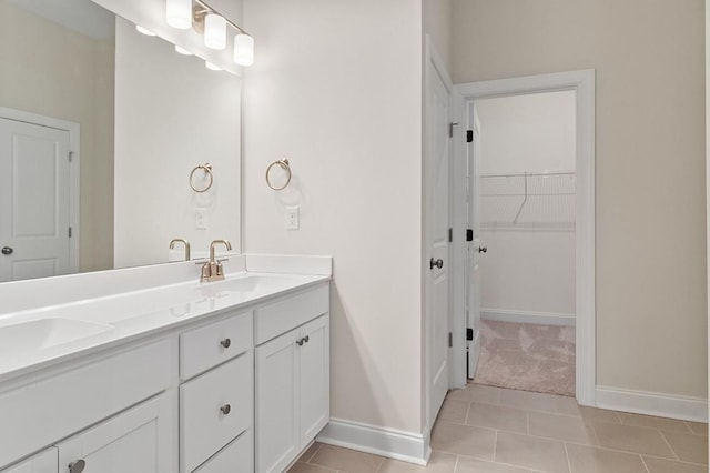 bathroom with vanity and tile patterned flooring