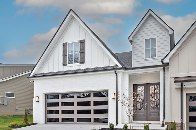 modern farmhouse style home featuring a garage