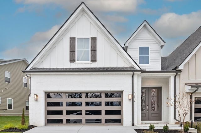 modern farmhouse style home with a garage