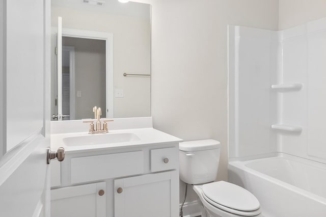 full bathroom featuring shower / tub combination, vanity, and toilet