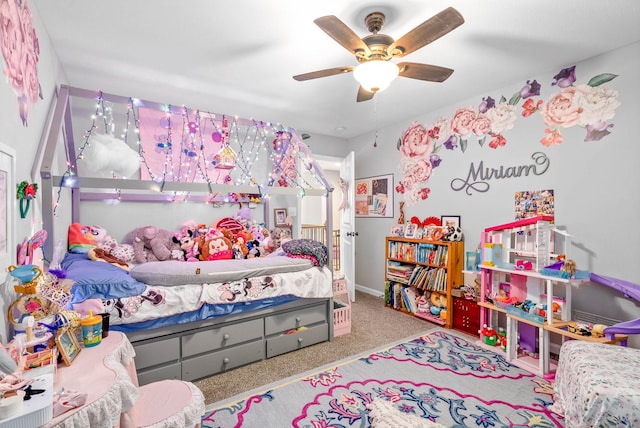 carpeted bedroom with ceiling fan