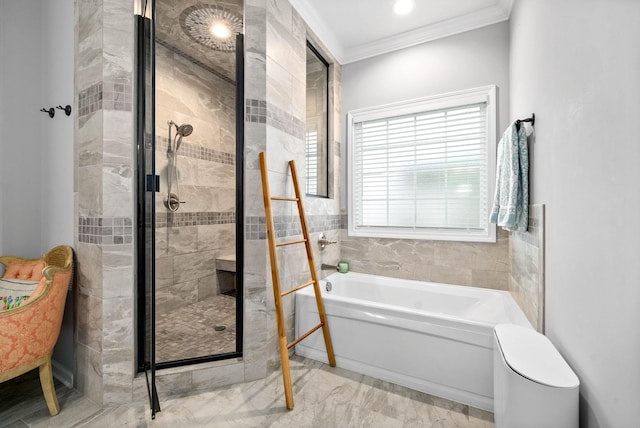 bathroom with crown molding and shower with separate bathtub