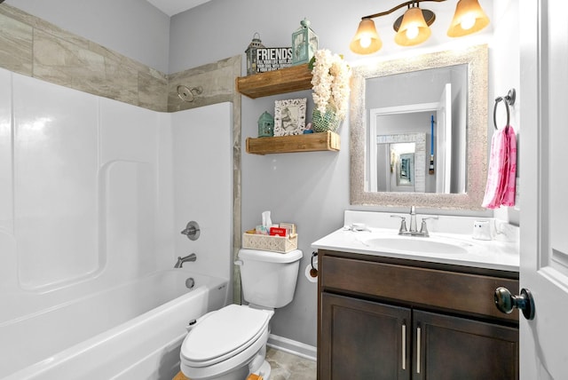 full bathroom featuring vanity, washtub / shower combination, and toilet