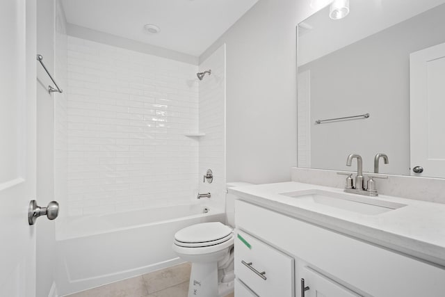 full bathroom with vanity, tiled shower / bath, tile patterned floors, and toilet