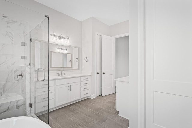 bathroom featuring vanity and plus walk in shower