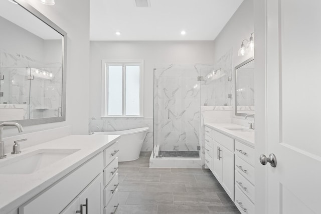 bathroom with vanity and plus walk in shower