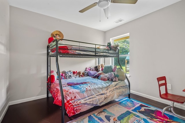 bedroom featuring dark wood-type flooring and ceiling fan