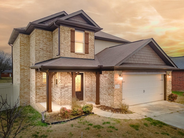 view of front of property with a garage