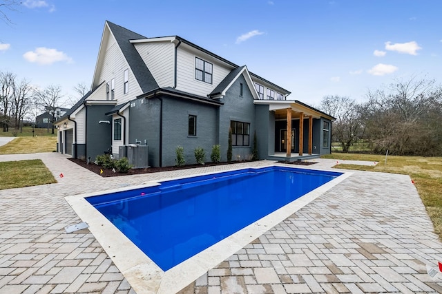 rear view of house with a patio