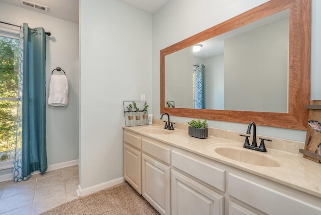 bathroom featuring vanity and tile patterned flooring