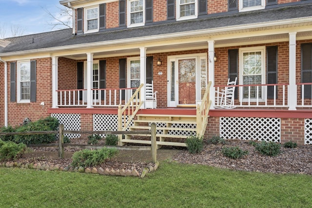 doorway to property featuring covered porch