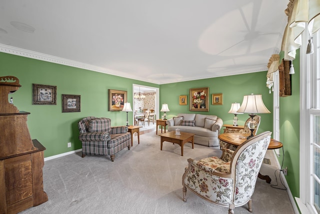 living room with crown molding, a chandelier, and carpet flooring