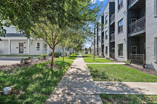 view of community with a yard