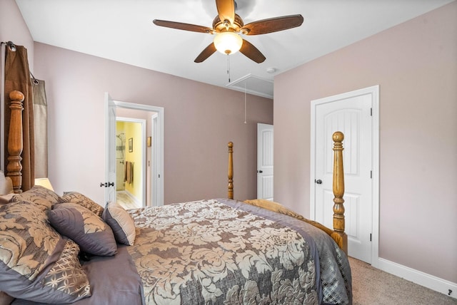 carpeted bedroom with ceiling fan and ensuite bathroom