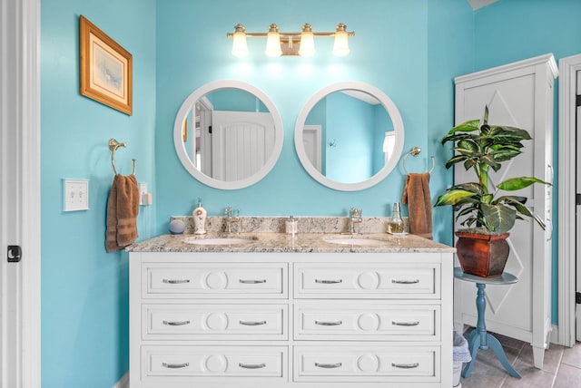 bathroom featuring vanity and tile patterned flooring