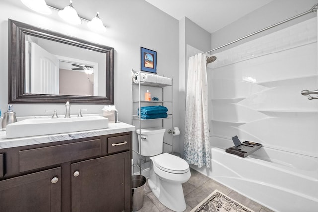 full bathroom featuring shower / tub combo with curtain, vanity, ceiling fan, toilet, and tile patterned floors