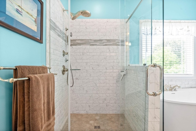 bathroom featuring walk in shower