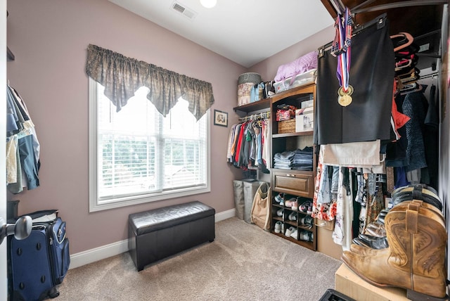 spacious closet featuring carpet floors