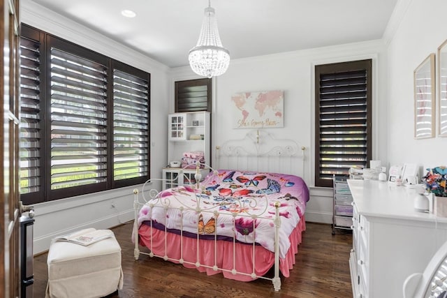 bedroom with crown molding, dark wood-type flooring, and a chandelier