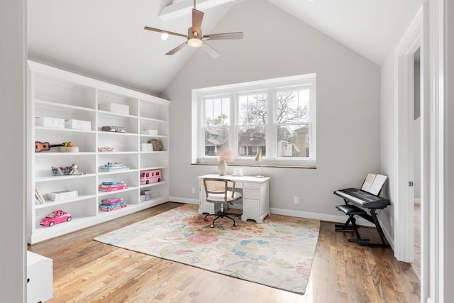 office area with lofted ceiling, ceiling fan, and light hardwood / wood-style flooring