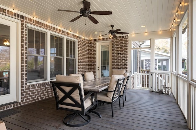 sunroom with wooden ceiling