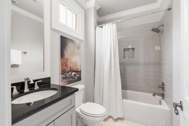 full bathroom featuring crown molding, shower / tub combo, vanity, and toilet