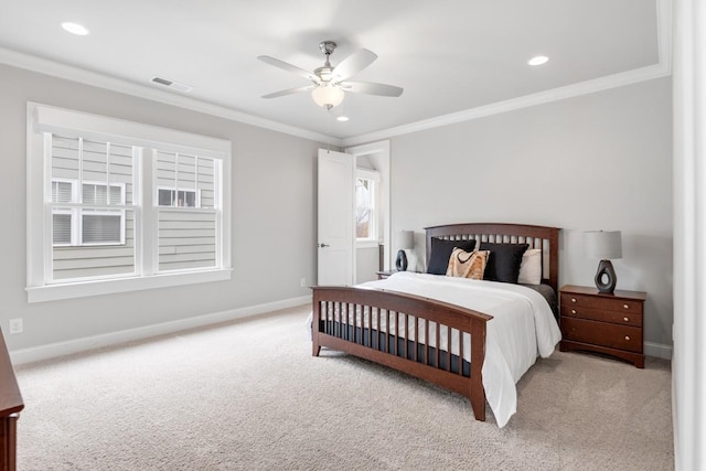 carpeted bedroom featuring ceiling fan and ornamental molding