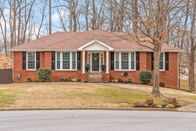 view of front facade with a front lawn