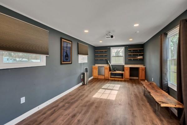 interior space with hardwood / wood-style floors